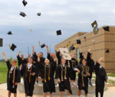 Seniors throwing up graduation caps