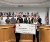 Education Foundation Presents Check to board